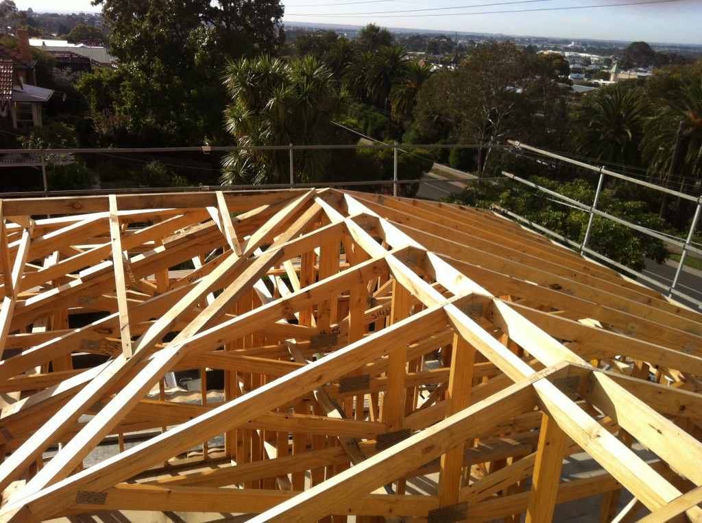 Framing roof materials for a shingle roof system